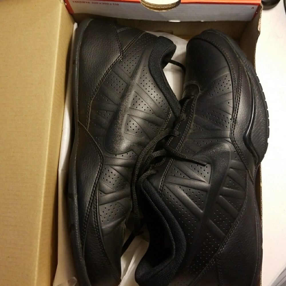 All black Nike shoes